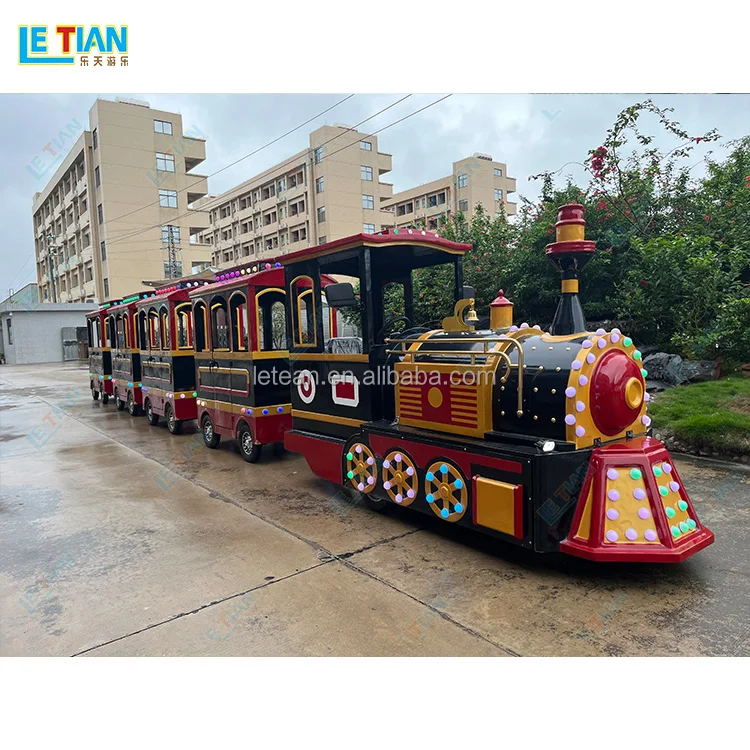 Outdoor public playground backyard kids locomotive train rides commercial shopping mall tourist trackless train