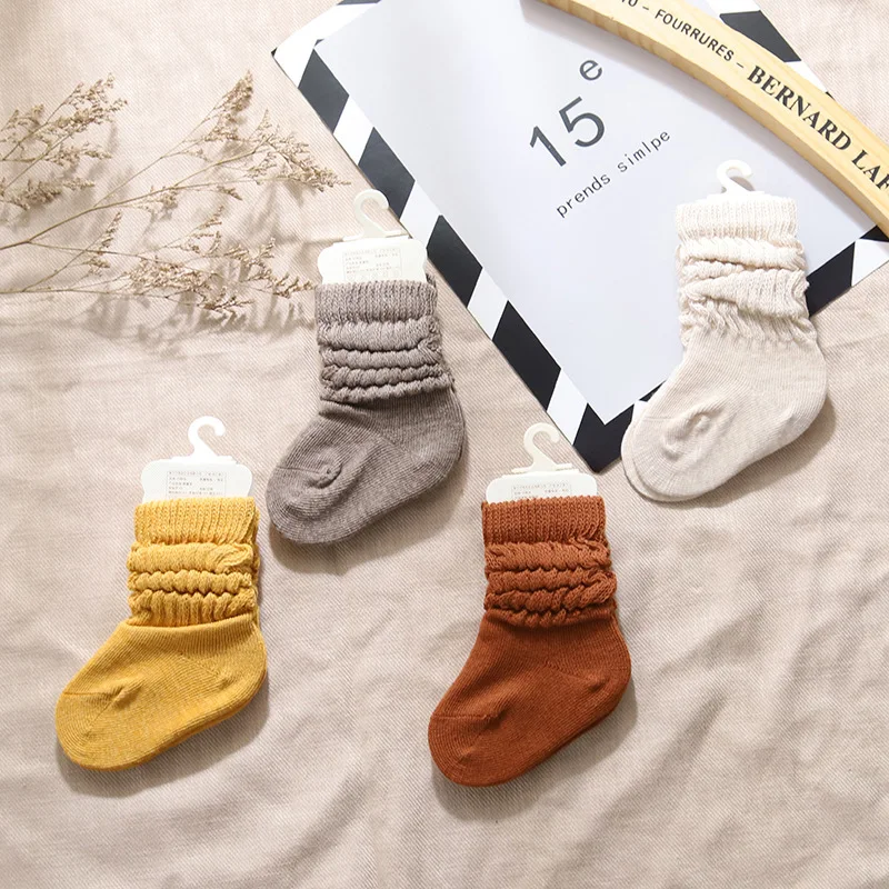 
2021 High quality solid color baby boy girl slouch socks combed cotton infant toddler socks breathable kids slouch socks 