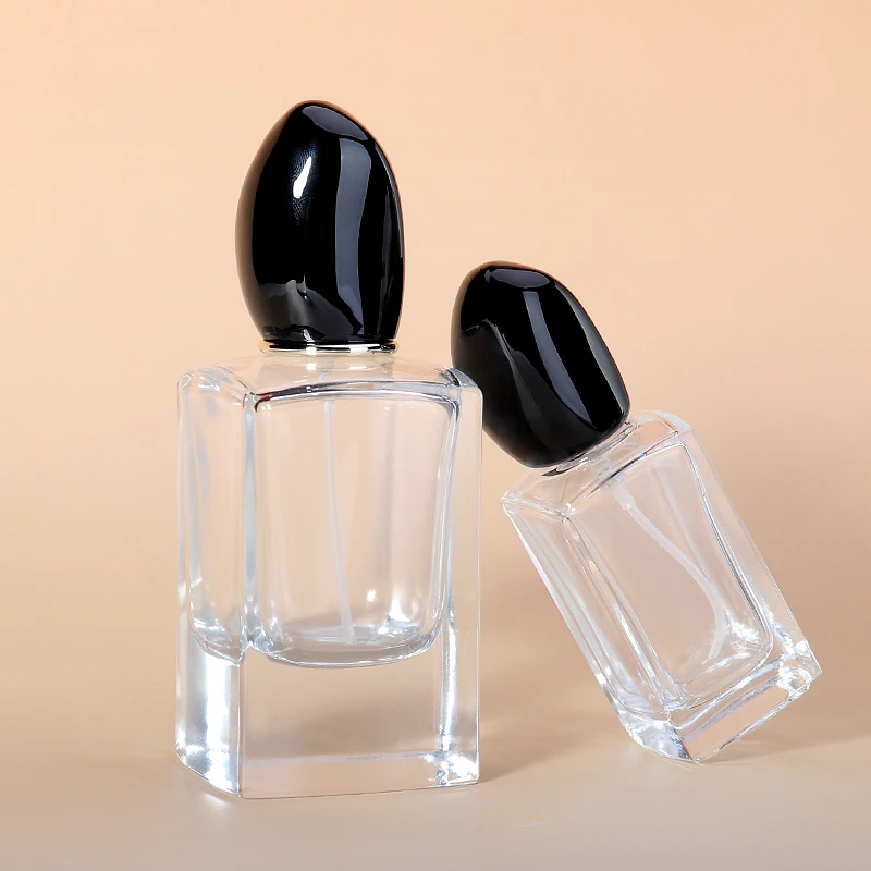 Luxury 100ml Transparent Glass Perfume Bottle Customized Empty with Matte Finish Lids Spray for Cosmetics Fragrance Creation