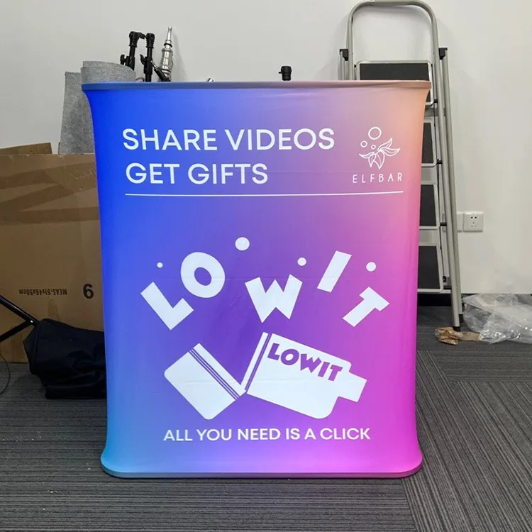 Low MOQ Exhibition Booth Portable Tension Fabric Advertising Display Auto Shrink Pop Up Display Counter Table