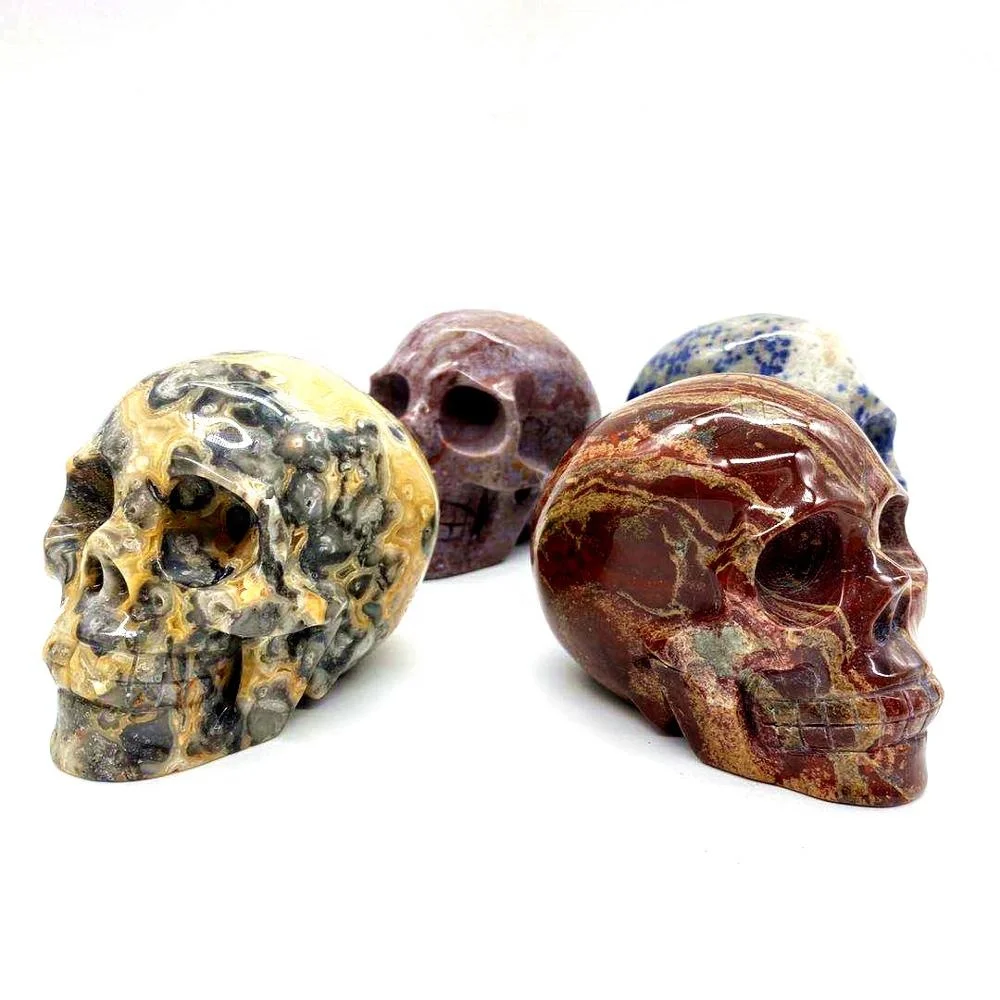 High quality hand carved natural crystal skull art sculpture folk crafts rainbow jasper skull for decoration