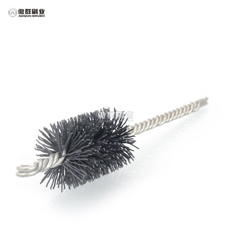 Щетка для чистки нейлоновых щеток с валом