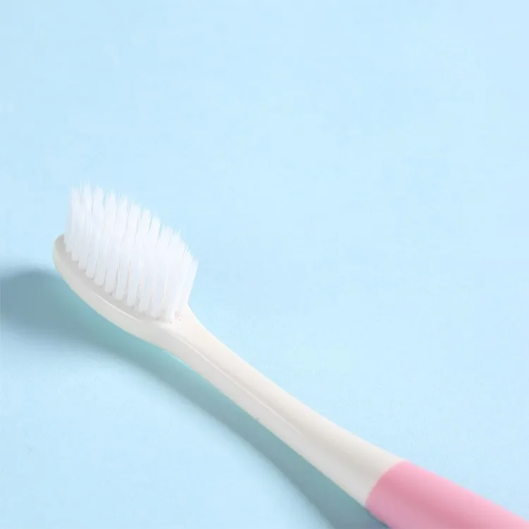 Popular Kids Toothbrush with Eraser Soft PBT/ Customized PP + Soft TPE OEM Colors for Free 50000pcs BSCI/BRC/ISO 9001