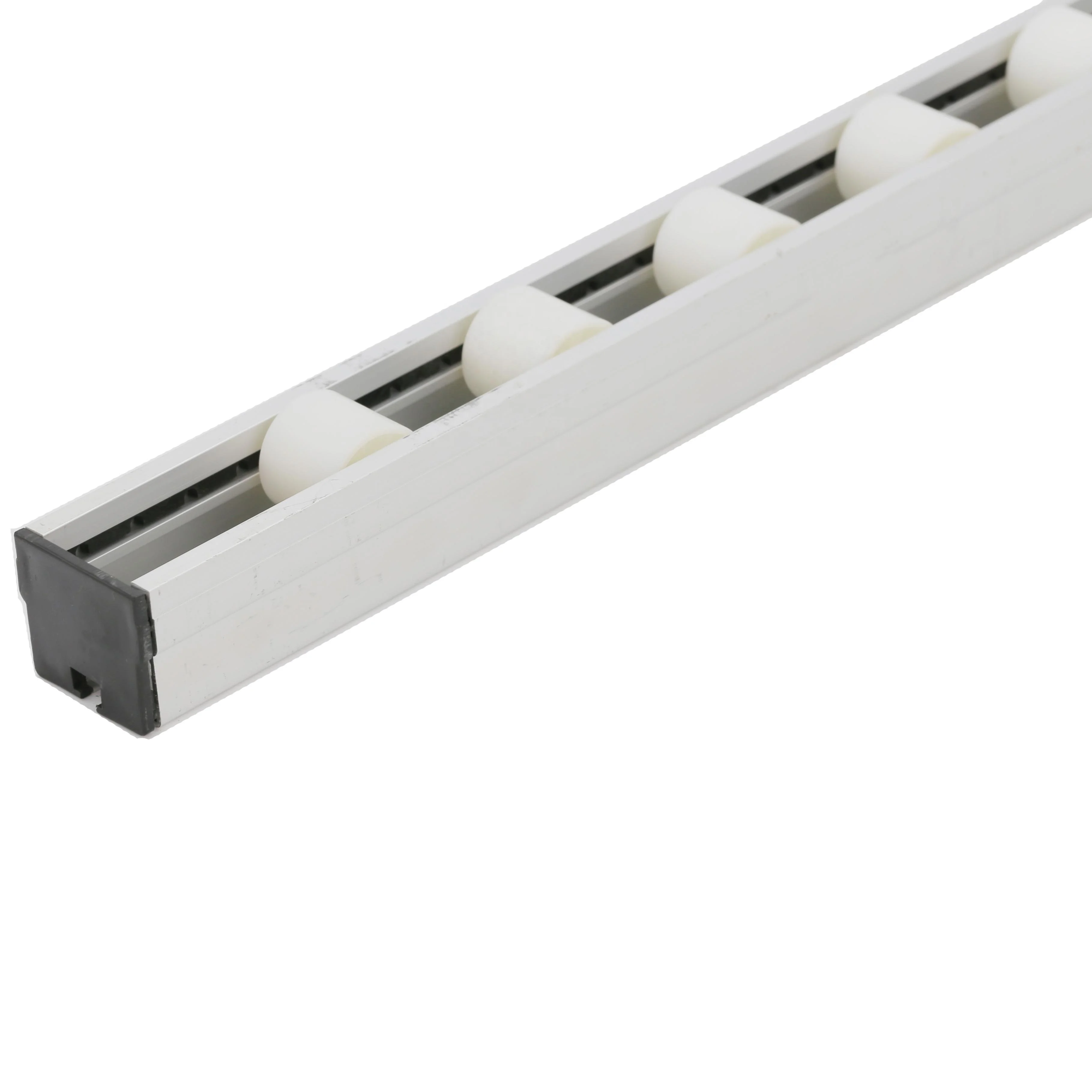 Gravity flow rail/roller track guide rollers for pipe rack system