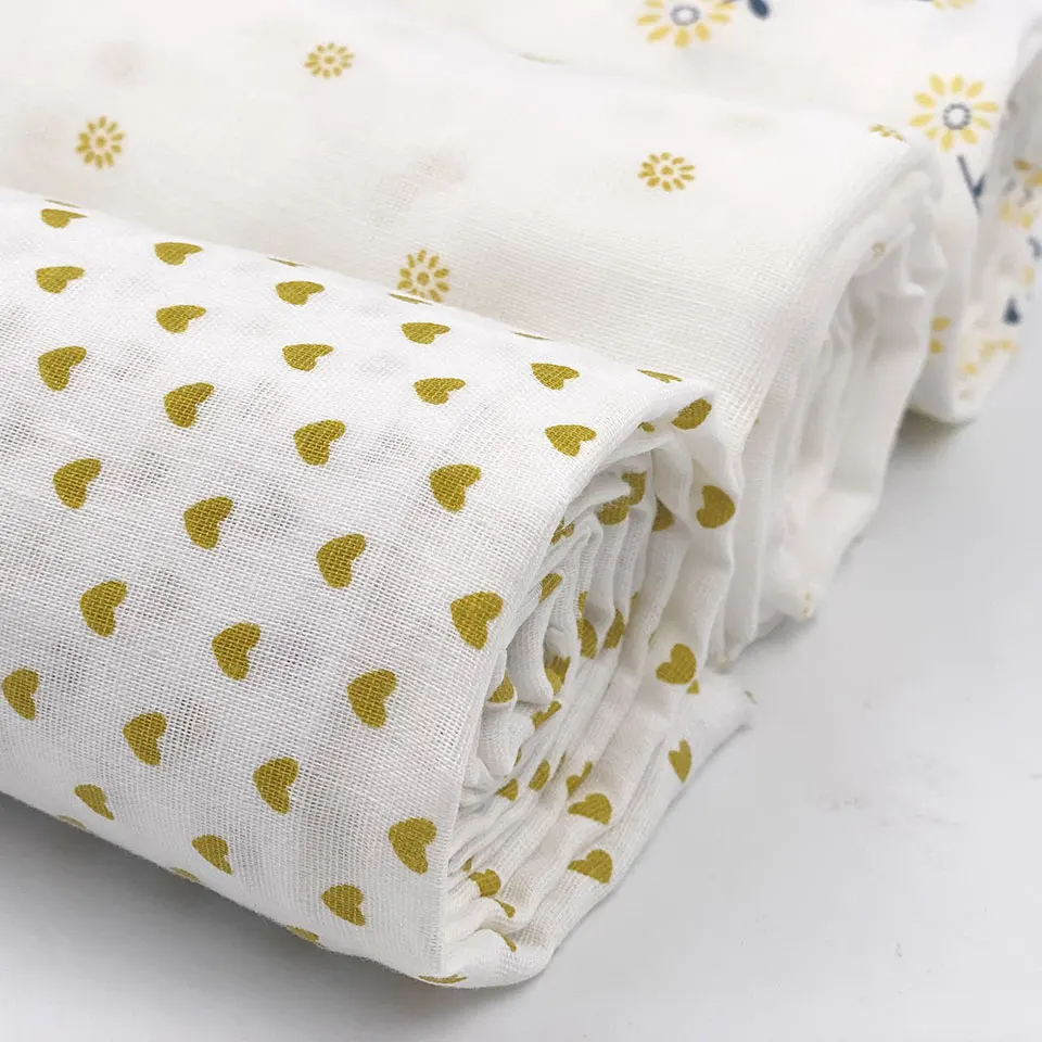 Cheap light weight soft stocklot custom printed 100% cotton double layers gauze crinkle muslin fabric for baby cloth swaddle