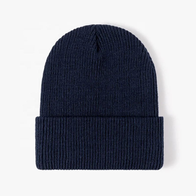 Wholesale in stock unisex plain acrylic colorful winter hats custom woven label tag rubber leather patch thick knitted beanie