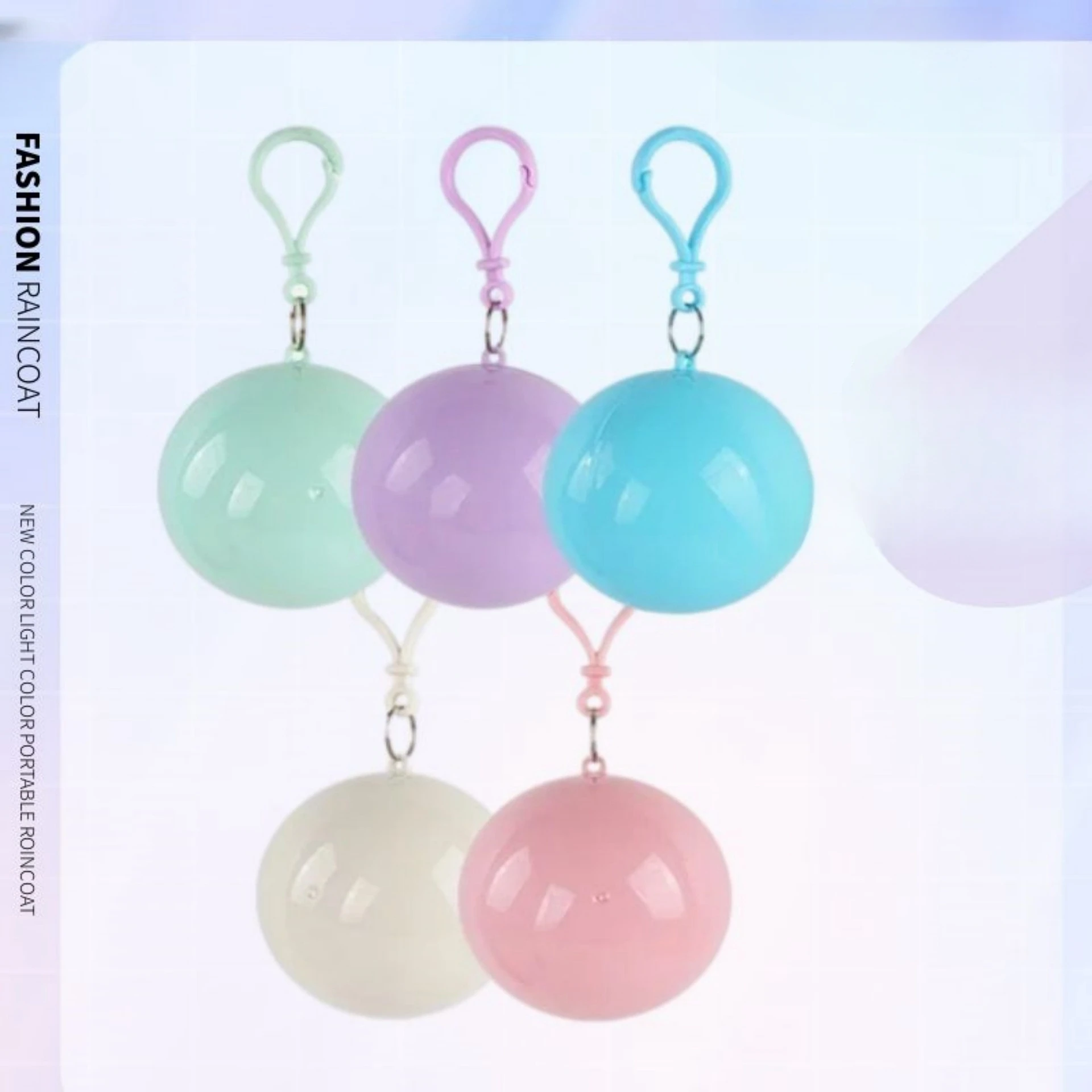 Wholesale PE Disposable Ball Raincoat Outdoor Camping Cheap Rain Wear Key Chain Touring Convenient Rainfreem Ball Raincoats