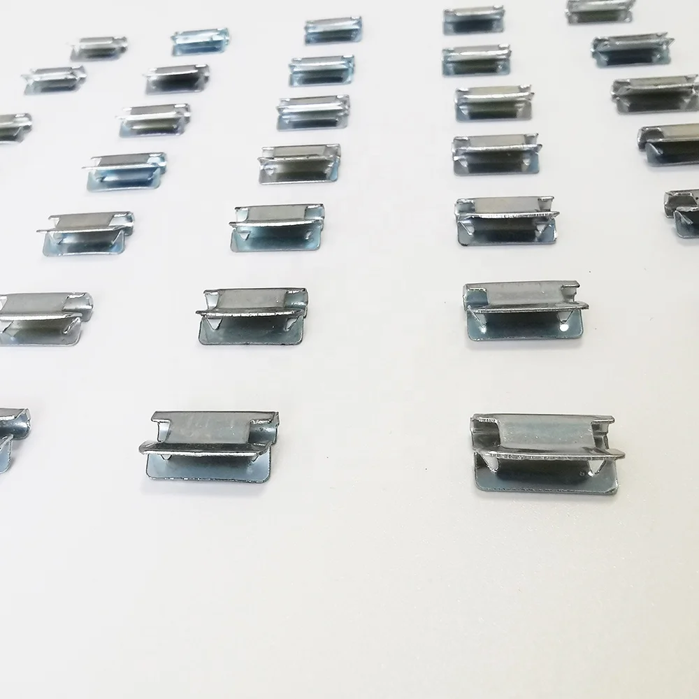 metal clips that secures a piece of armor and an bellows cover