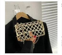 2023 European and American fashion metal cage female hand bag small hollow box bag fashion chain female shoulder crossbody bag