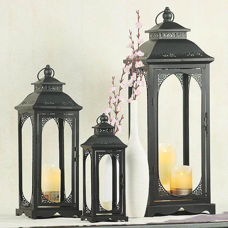 European retro hollow wind lamp, handicraft decorative ornaments, wrought iron glass metal candle holder wind lamp