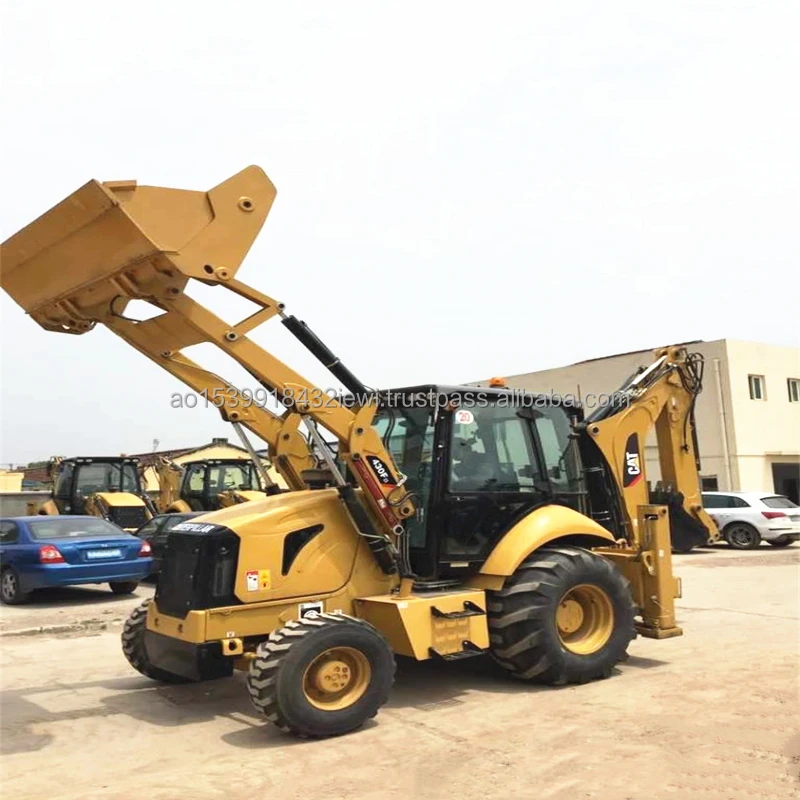 Реальный снимок экскаватора-погрузчика catapillar CAT430F