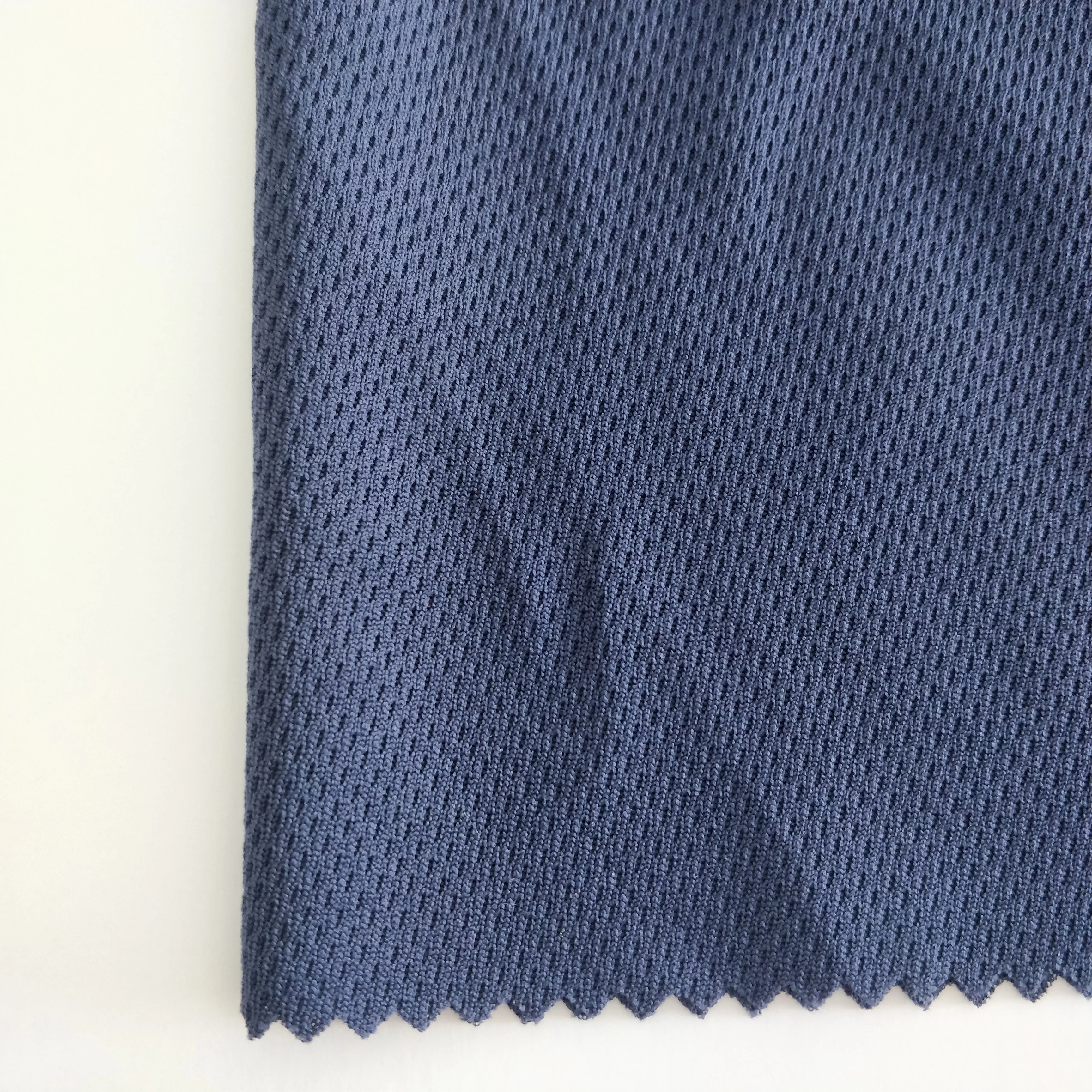 Трикотажная однотонная эластичная сетчатая ткань из 100% полиэстера для спортивной одежды/футбольной формы