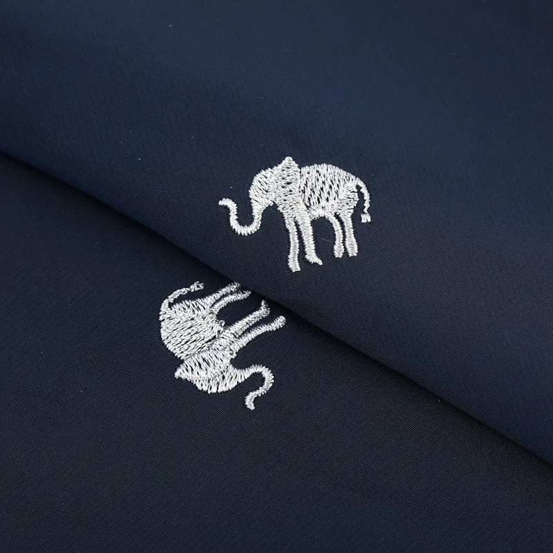 
In stock T400 fine twill embroidery for down jacket windbreaker jacket stretch embroidery fabric 
