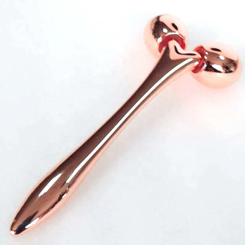 Luxury golden metal spatula in cosmetic along with skincare cream jars