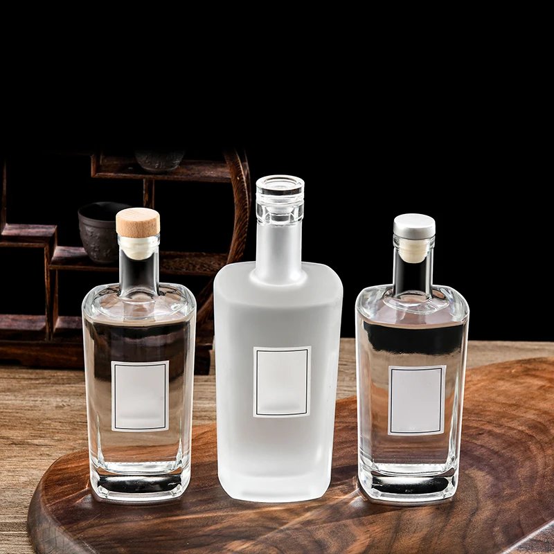Wholesale high quality lead free glass liquor bottle 500ml 700ml frosted transparent square spirit wine bottle with cork