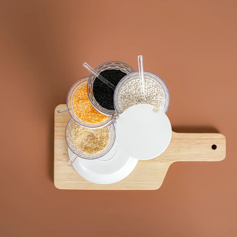 
standing type rotatable seasoning jar box Kitchen transparent plastic condiment storage box 