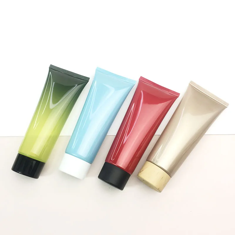 Green gradient empty plastic cosmetic packaging squeeze soft tube capacity 100 g and black outer packing carton are in stock