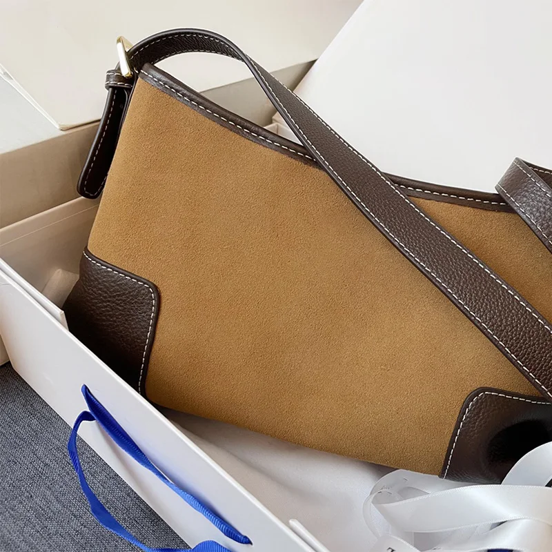 Fashionable armpit shoulder messenger bag Suede stitching retro first layer cowhide bag Model: 10166 Size: 28