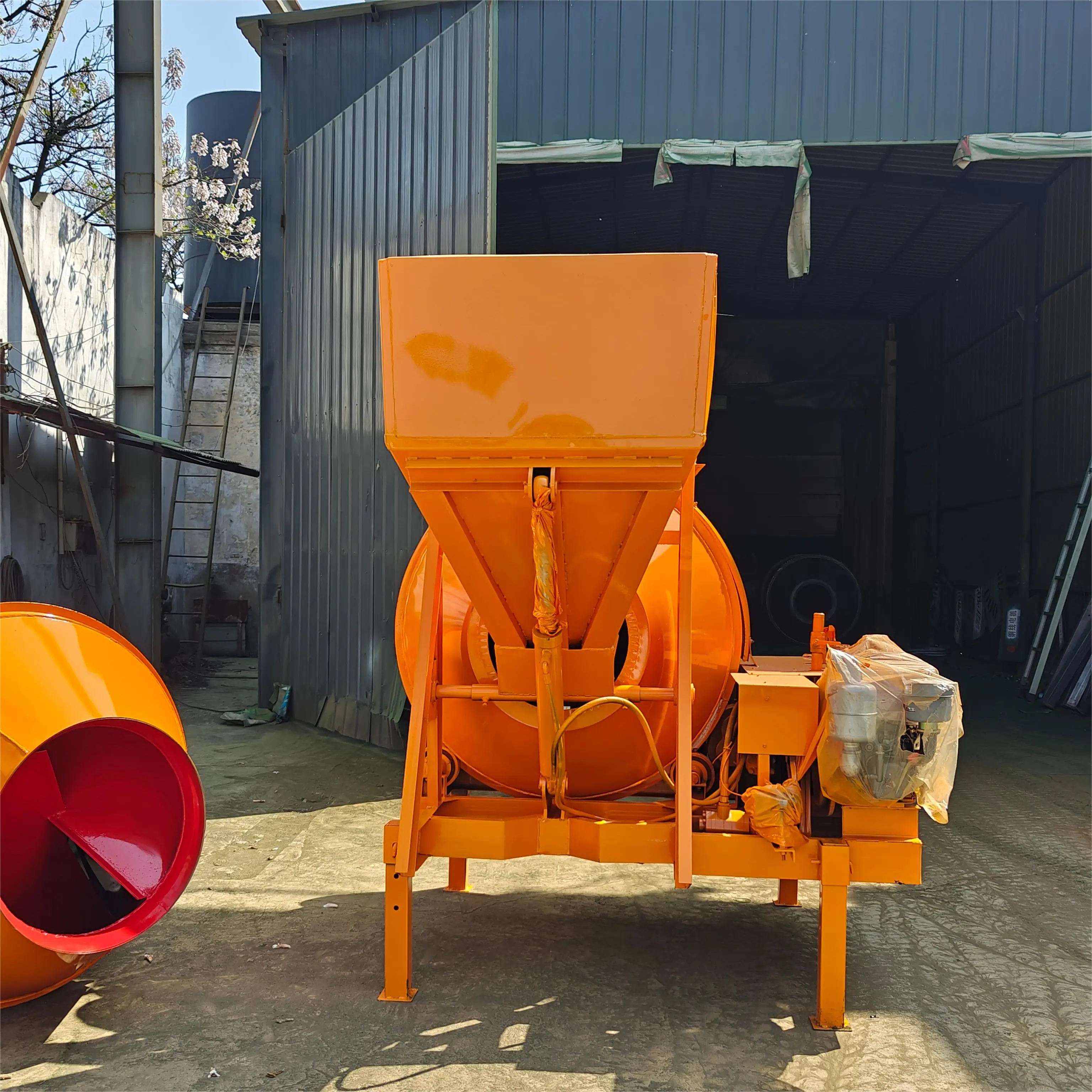 Cement Mixer With Lift Hopper Drum Roller  Cement Concrete Mixer With Self Loading Drum