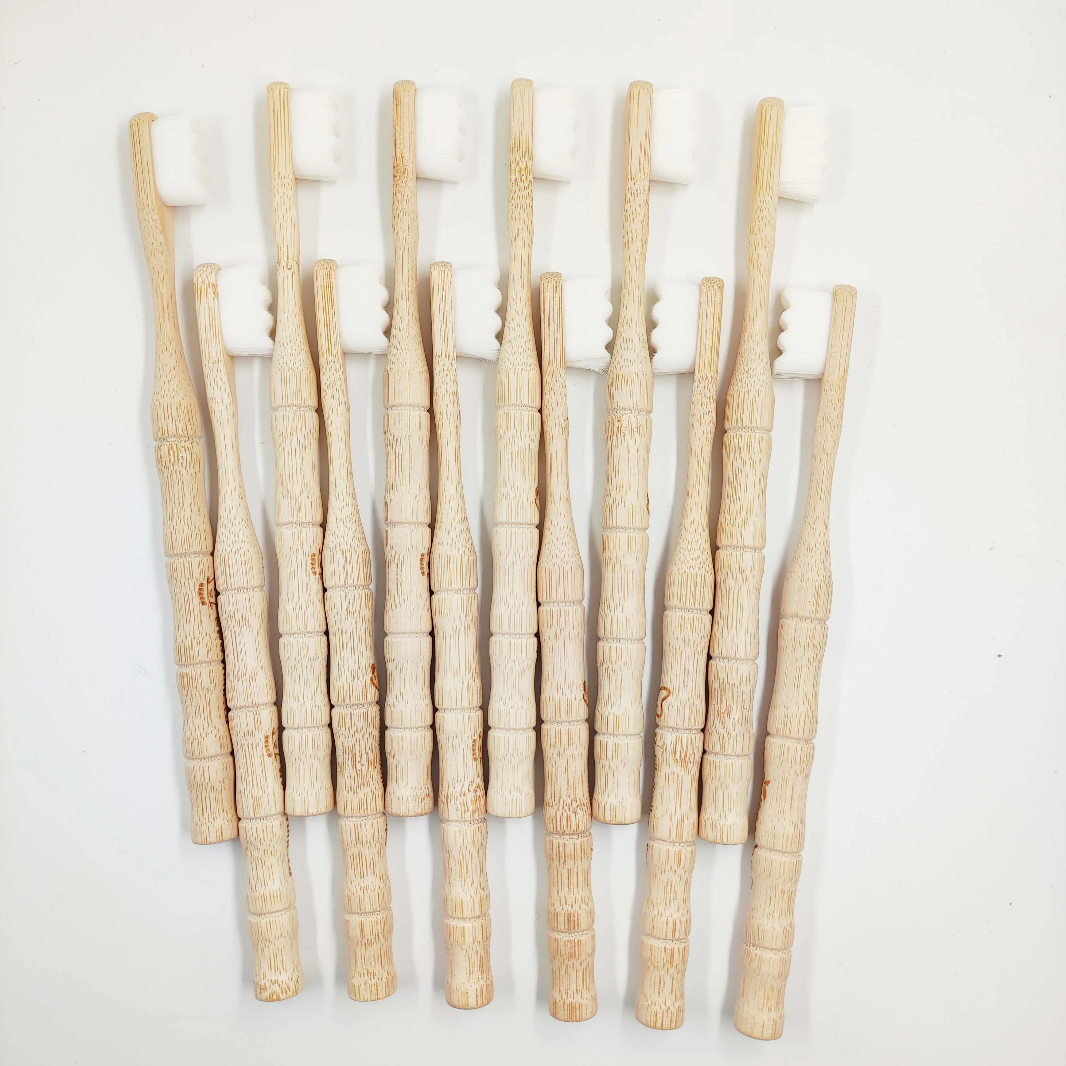 2023  New Arrival AA Pure white/black super fine bristles toothbrush 10000 Soft Floss Bristle Ultra Toothbrush Adult for Gum