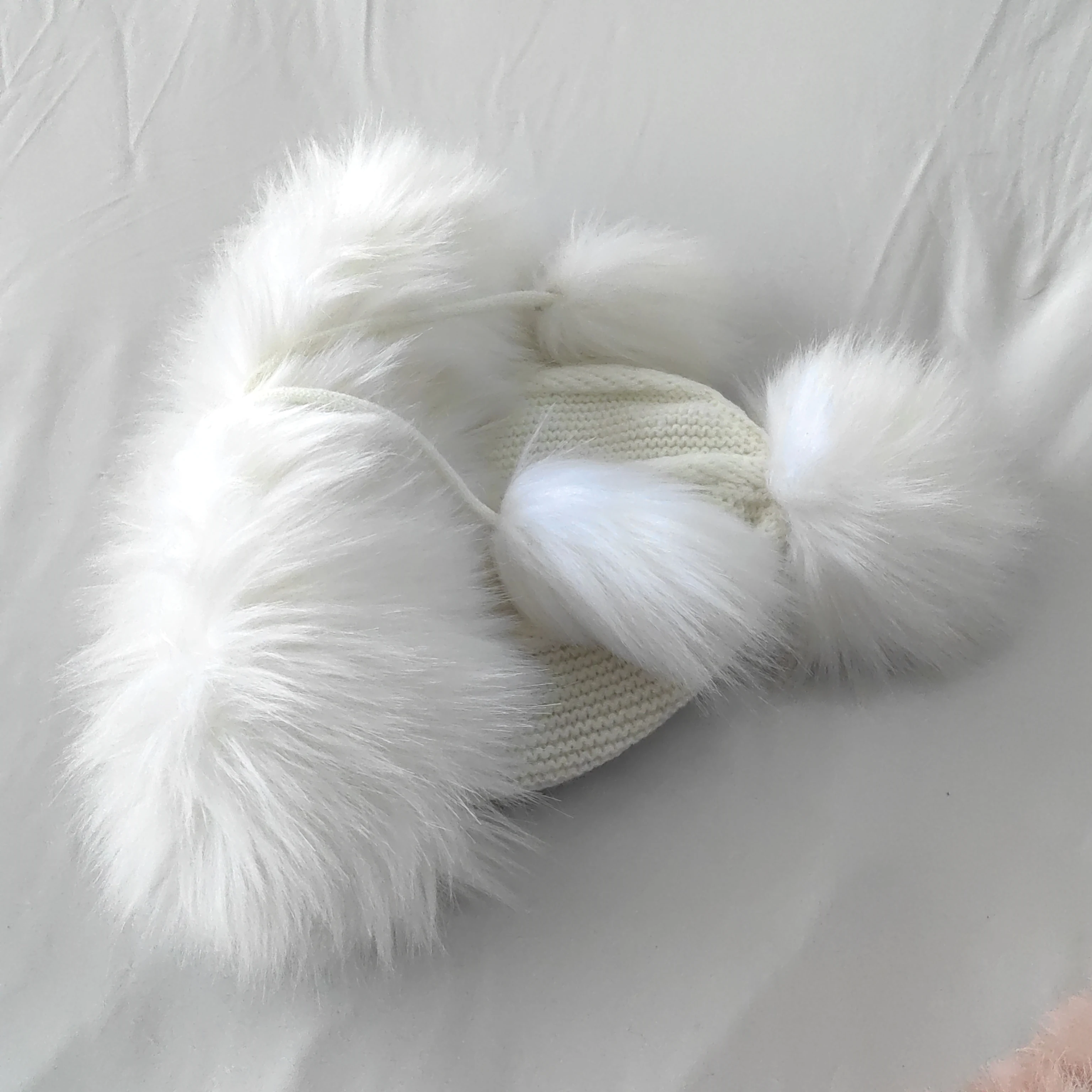 The factory supplies artificial wool cold-proof noble hair ball warm children knitted hat