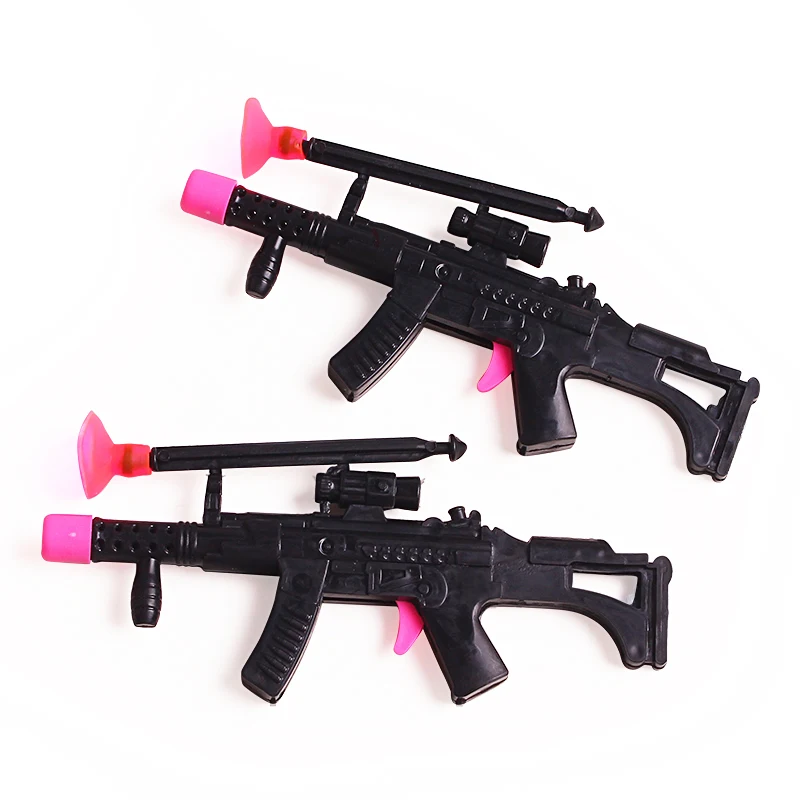 Wholesales Funny Playing Mini Black Gun Toys Catapult Gun Candy Toys