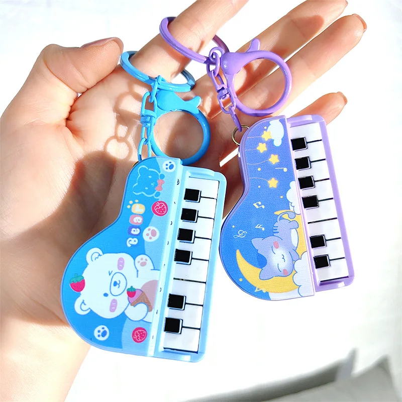 Creative mini piano keychain cute glowing decompression music toy