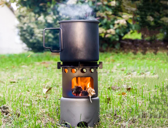 Wholesale Portable Outdoor Biomass Burning Pellet Camping Backpacking Titanium Wood Stove