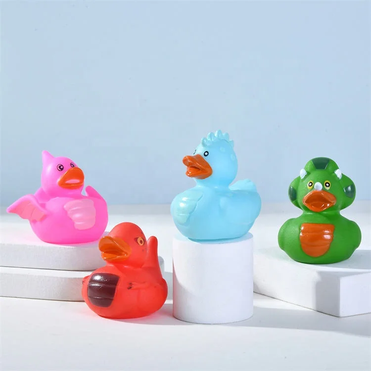 Wholesale 2-Inch Bathtub Design Rubber Spray Custom Dinosaur Shape Baby Bath Toys Small Duck Toys