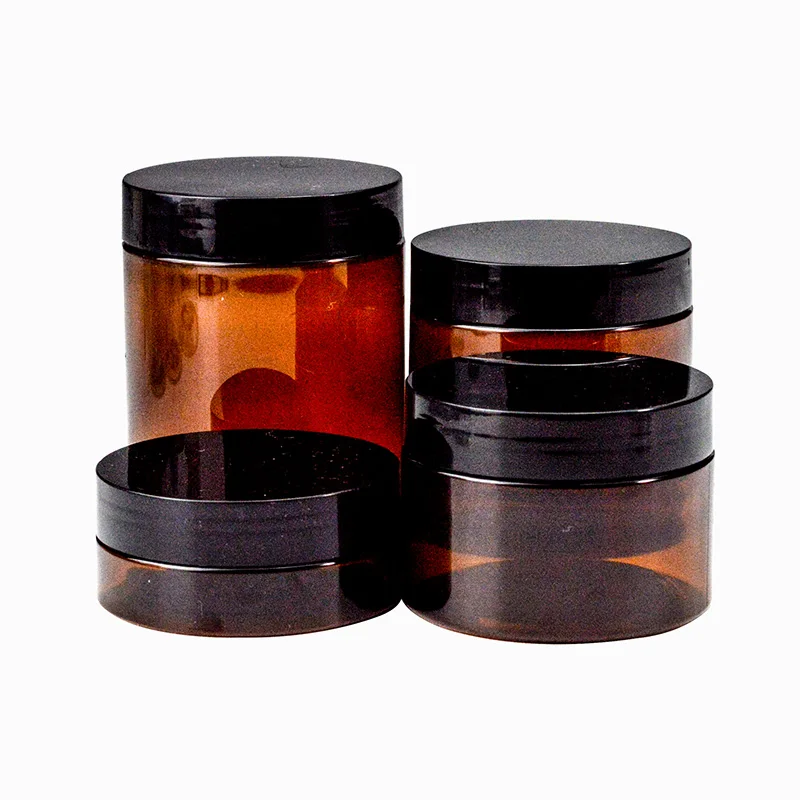 Wholesale cosmetic food packaging 100ml 150ml 200ml amber black pet plastic cosmetic cream jar with white black lid