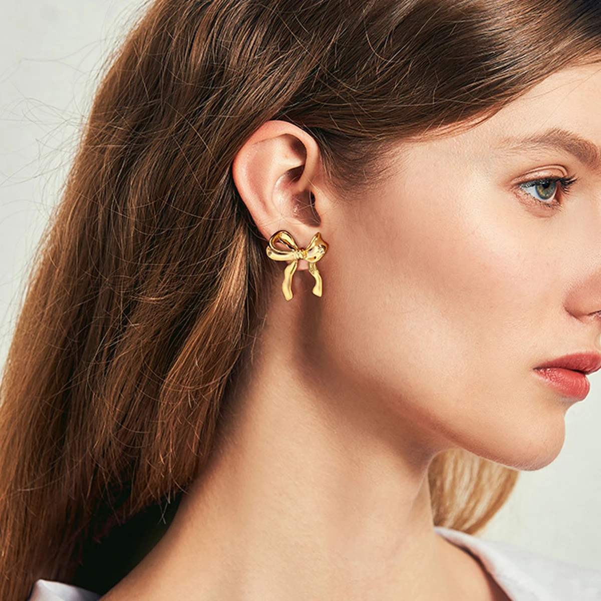 Fashion jewelry 18k gold plated bow jewelry 925 sterling silver needdle hypoallergenic bow stud earrings for women