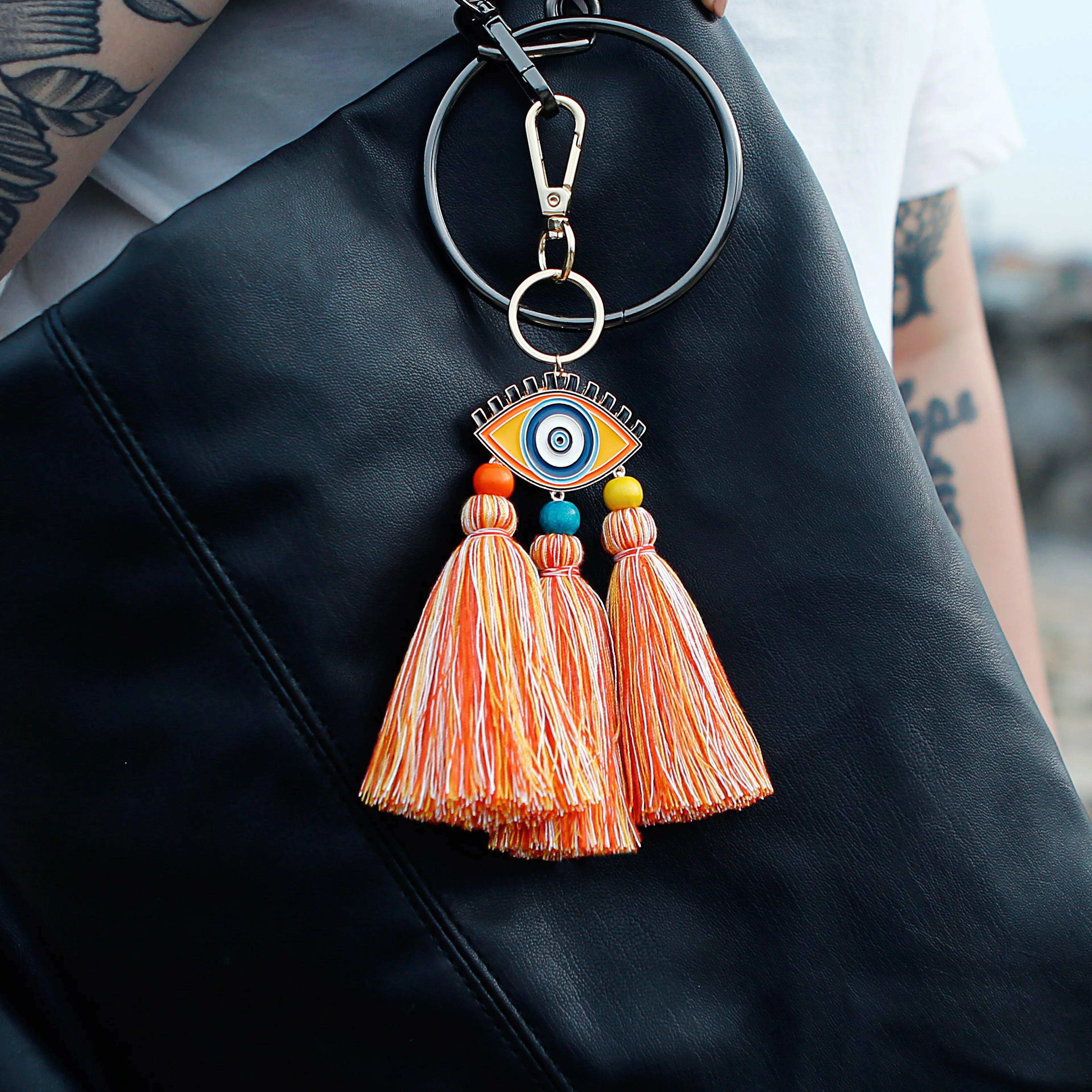  New design fashion personalized enamel devil eye 100% cotton tassel macrame keychain bag charm for