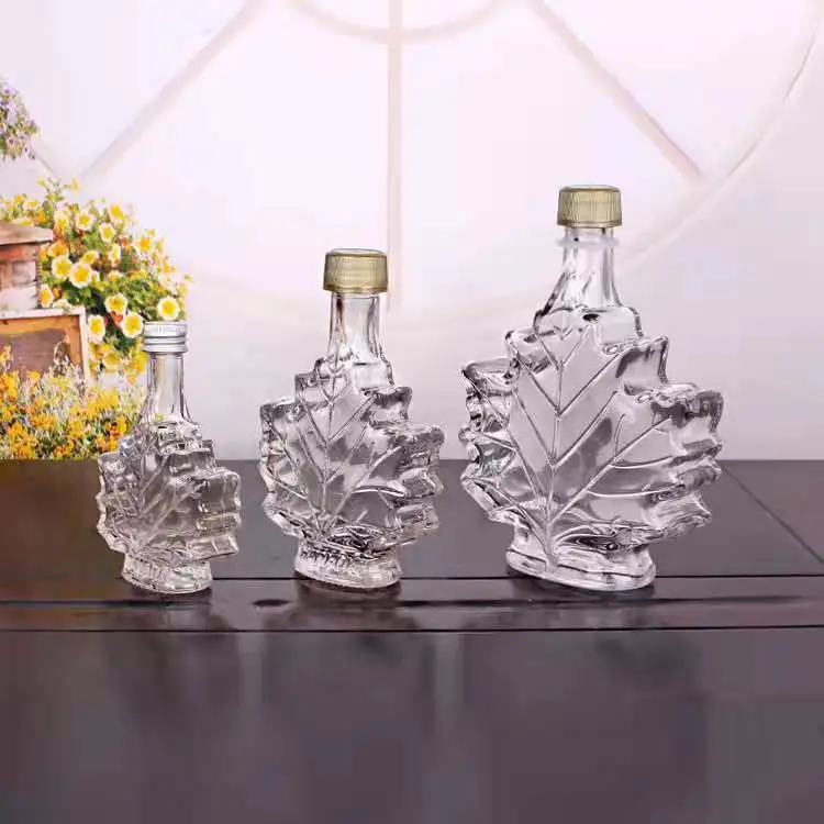 
50ml 100ml 250ml maple leaf unique design mini glass bottle 