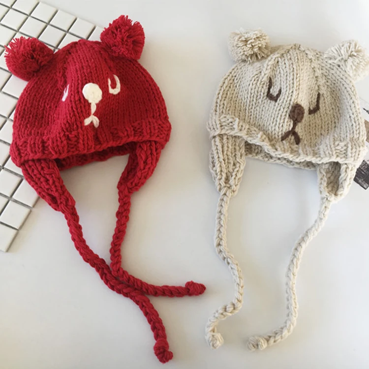 
Fur Ball Knitted Hat Accept Own Logo custom striped beanie faux fur wolf head hat 