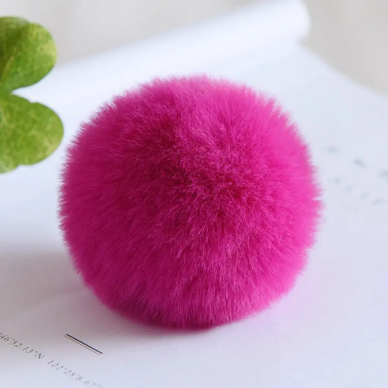 Wholesale Bulk Custom Big Soft Safety Fluffy Faux Fur Plush Pompoms Reversible Octopus Balls Toy Keychains With Cotton Tassel