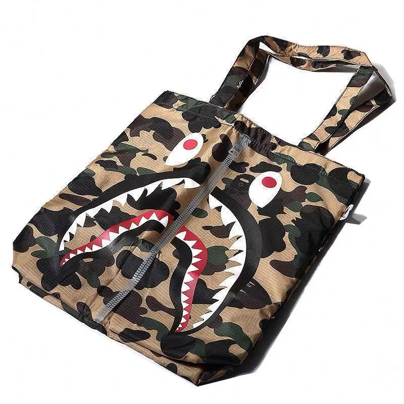 INS Hot BAPE Bags Camouflage Shark Red Eyes Black Teeth Print Simulated Zipper Tote Bags Trendy Shoulder Couple Bags