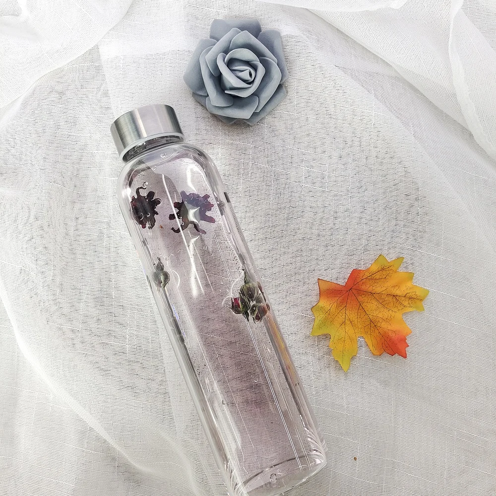 High Borosilicate Custom Logo Clear Glass drinking Bottle Luxury Style Smooth Glass Water Bottle With Sealing lid