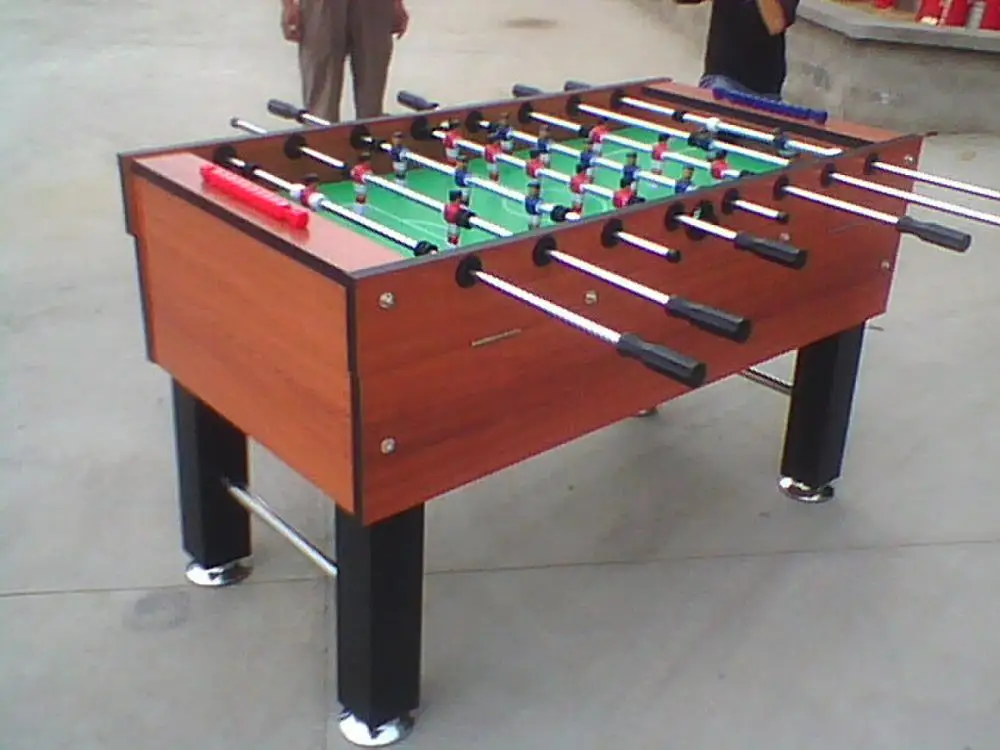 Coin-operated soccer/football table