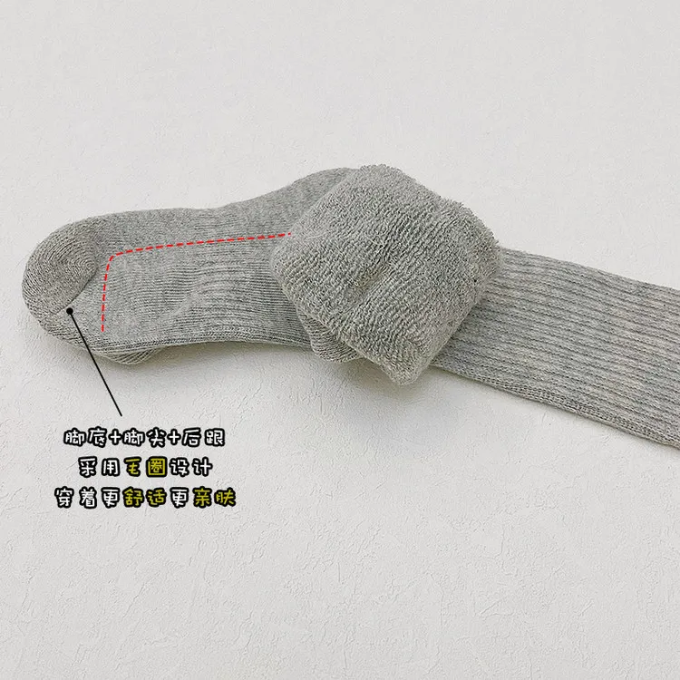 Hot selling cotton children long socks custom logo fashion comfortable school black white grey kids with phrases terry socks