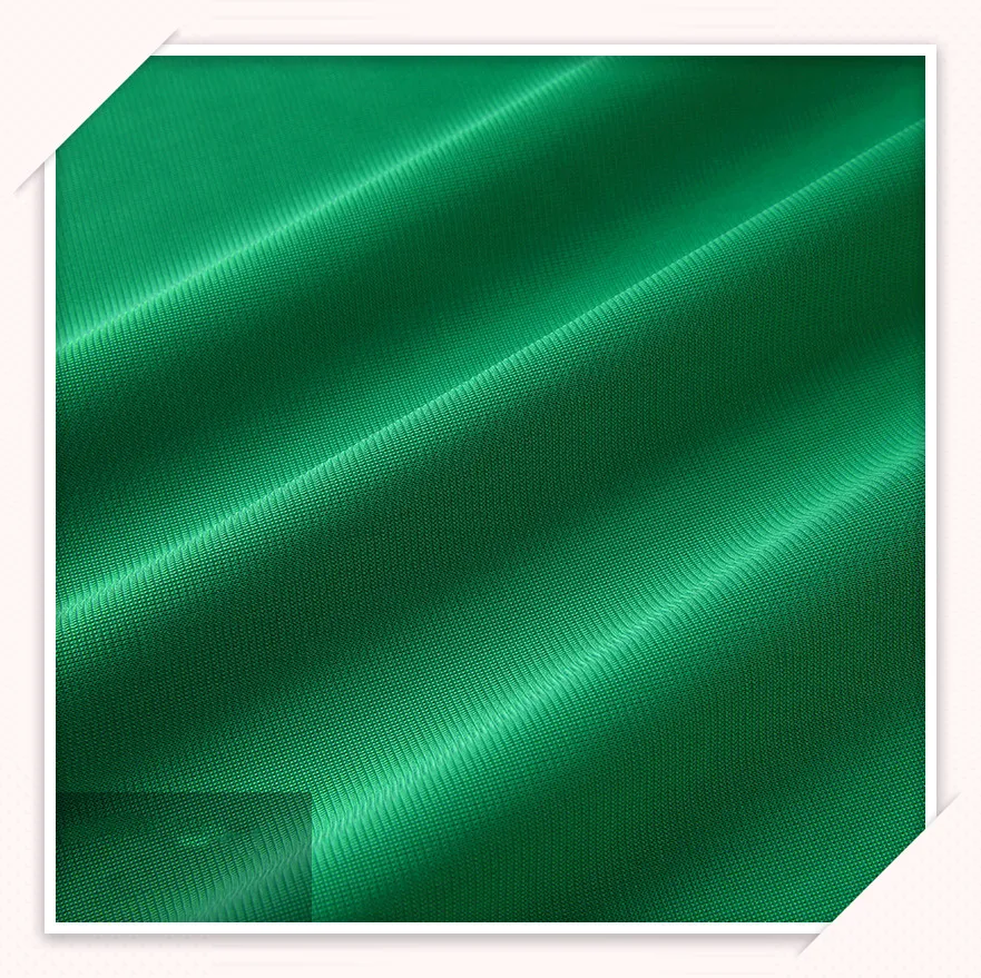 
Stock Items Green Color Polyester 100% Sustainable Fabric Plain Style Super Poly Fabric For Garments 