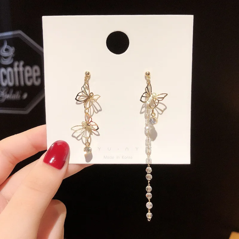 Han Jue jewelry factory thin Bow Earrings female long style asymmetric tassel high sense Korean Earrings