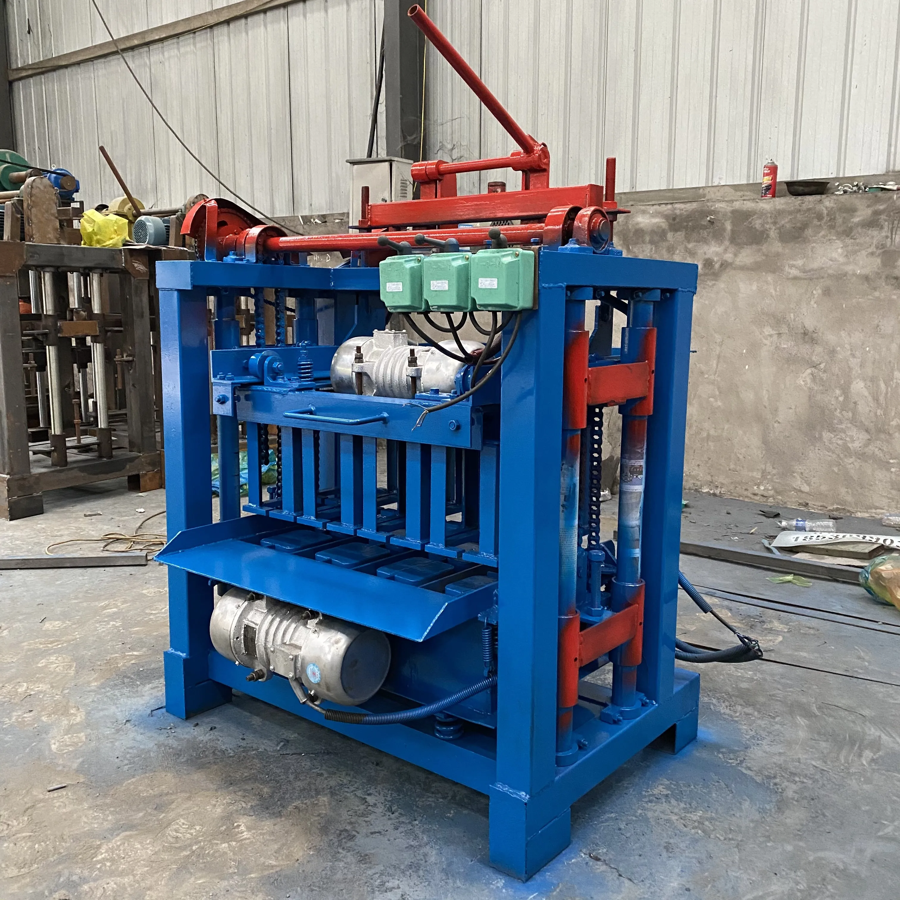 High efficiency manual brick making machine  rural construction small interlocking cement brick machine for African users