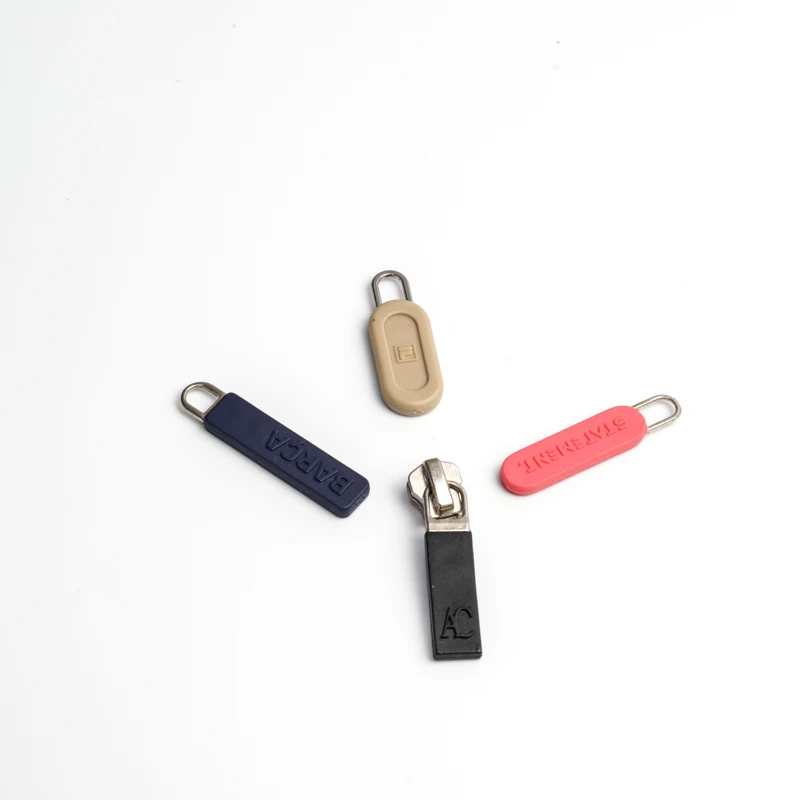 Custom woven rubber silicone pvc logo plastic round zipper puller slider and puller with logo for bag