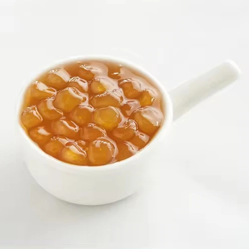 Customized Bubble Tea Ingredients Supplies Amber Raw Tapioca Boba Pearl Milk Tea Topping 9.5mm For Sale