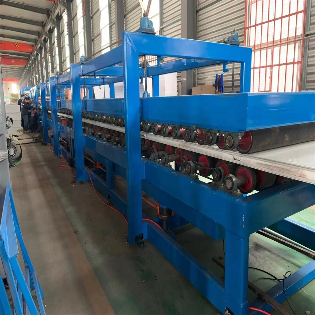 Building material machinery color steel roof and wall sandwich panel production line