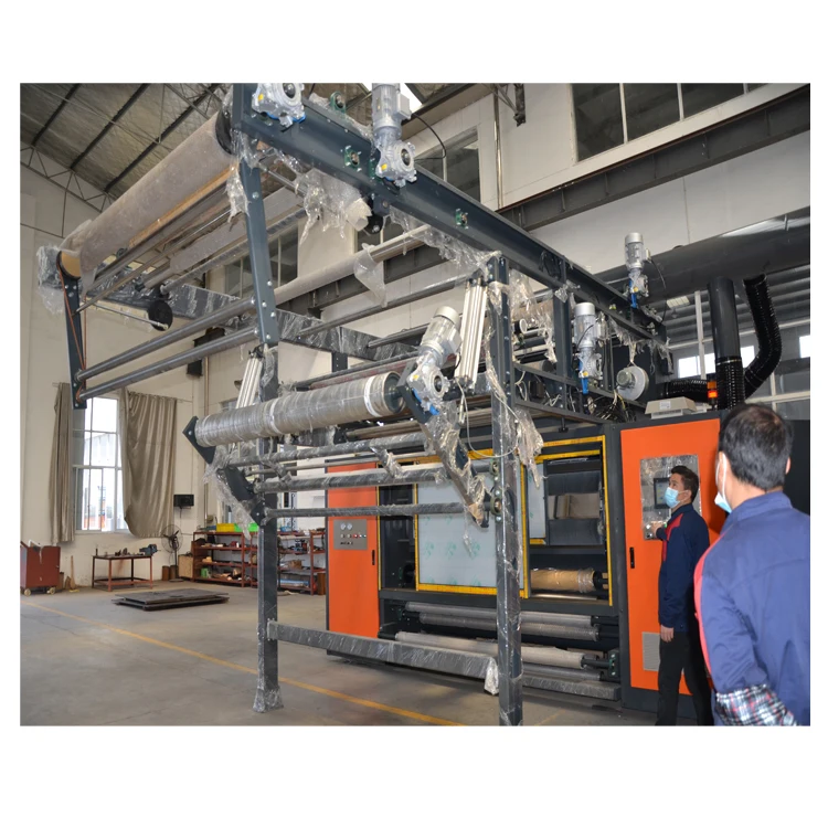 Sueding machine with coiling device for knitting fabric