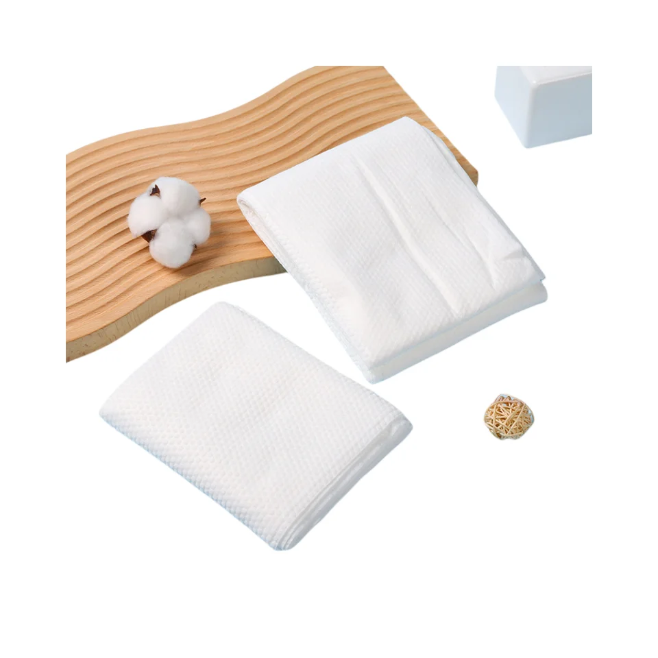 Compressed bath towel thickened and increased disposable portable individually packaged non-woven 70x140