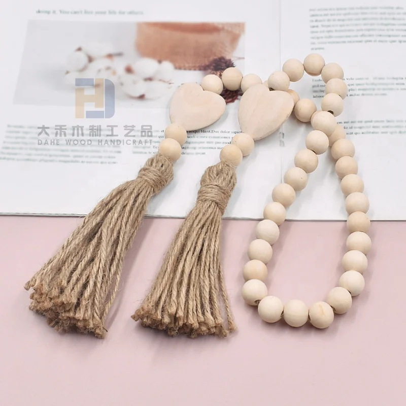 Factory Wooden Heart Shaped Natural Color Rustic Long Wood Bead Garland with Tassels for Home Decoration Wall Hanging Gift