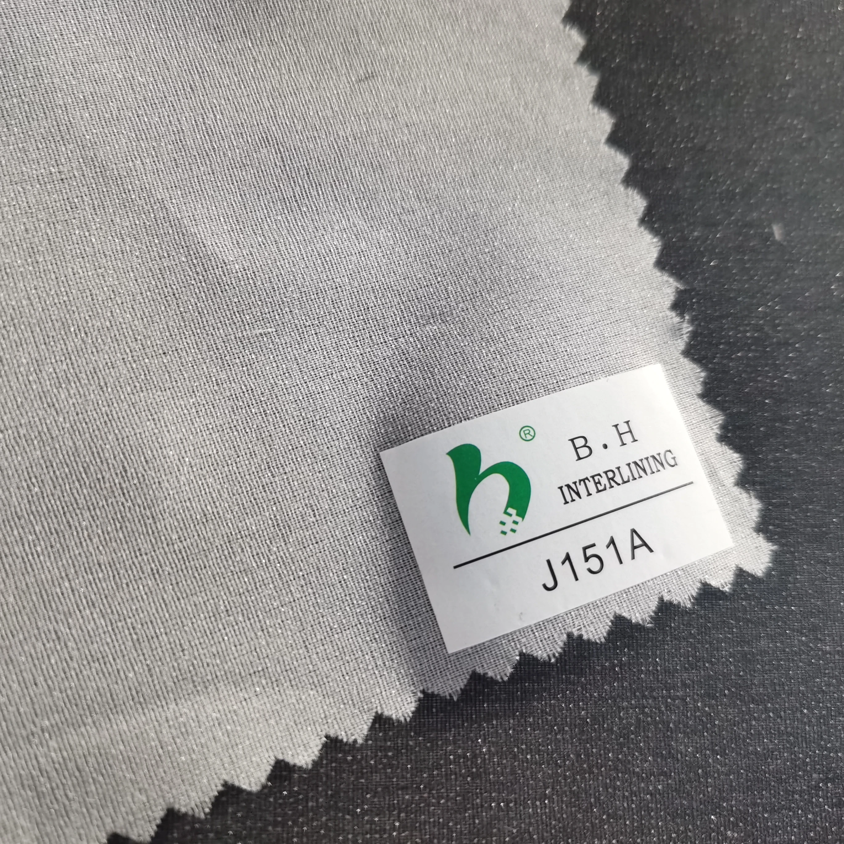 15D Eco-friendly 100% polyester woven fusible interlining PA double dot water jet woven fabric iron on coat