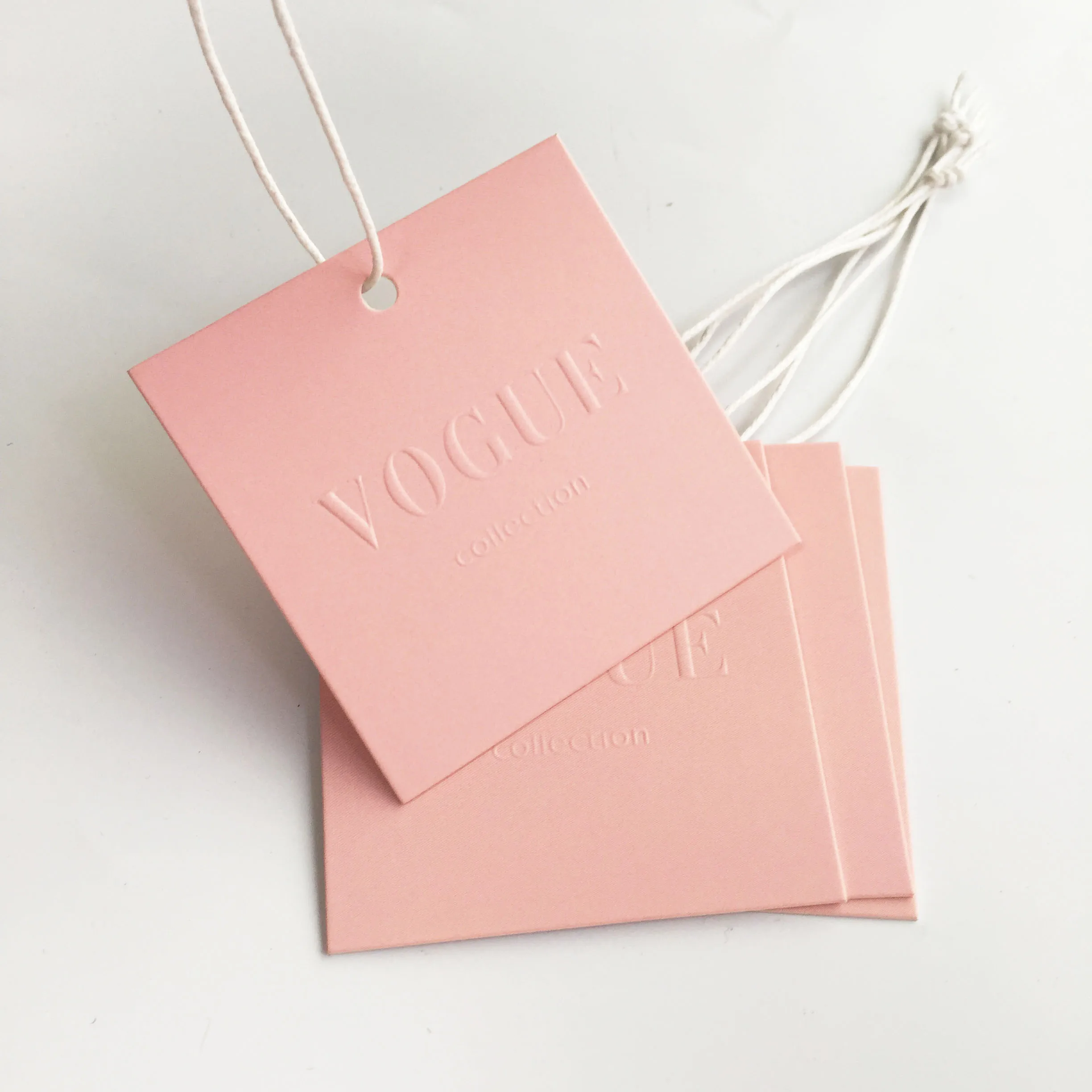 Custom Embossed Brand Logo Eco-friendly Pink Paper Garment Shirt Shoes Bags Swing Hang Tag for Clothing
